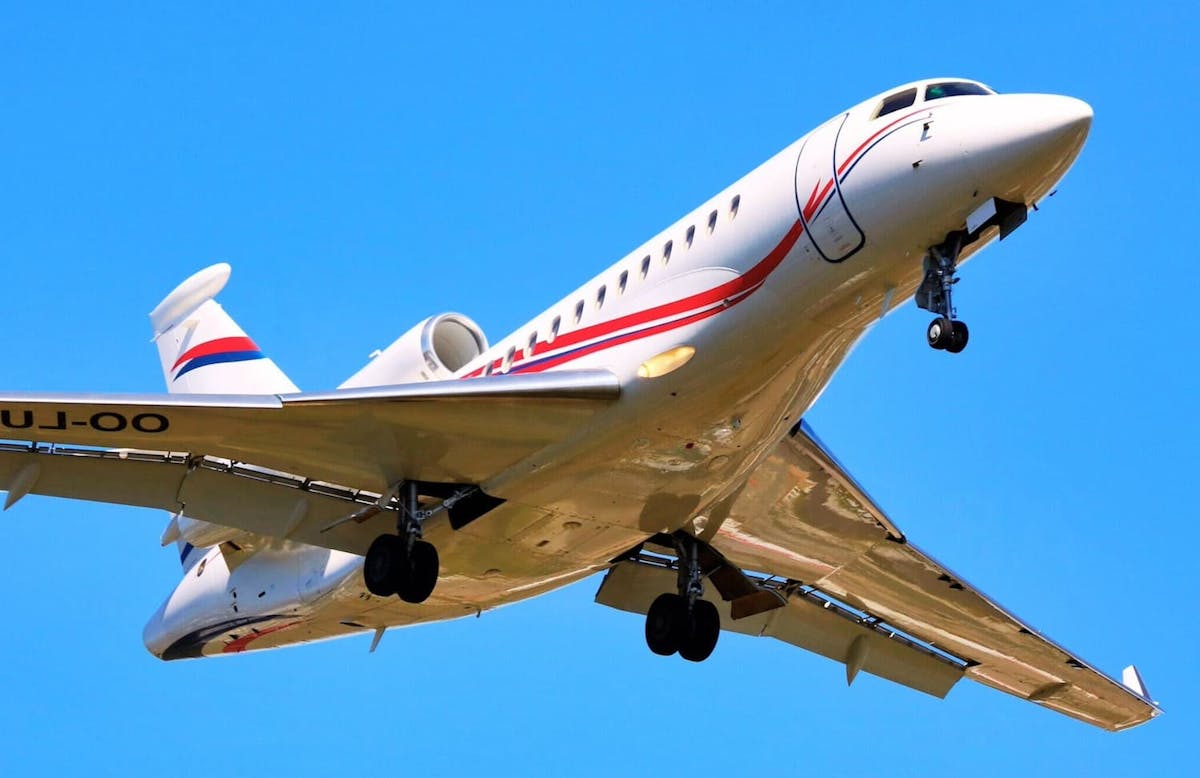 A Dassault 7X private jet with its gear down prior to landing.